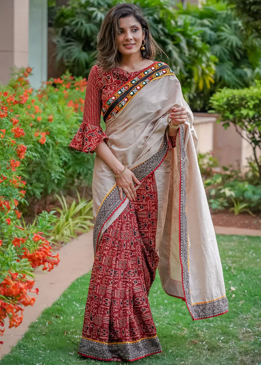 Stylish Ajrakh Cream Color With Mirror Digital Work Border Printed Cotton Linen Saree.